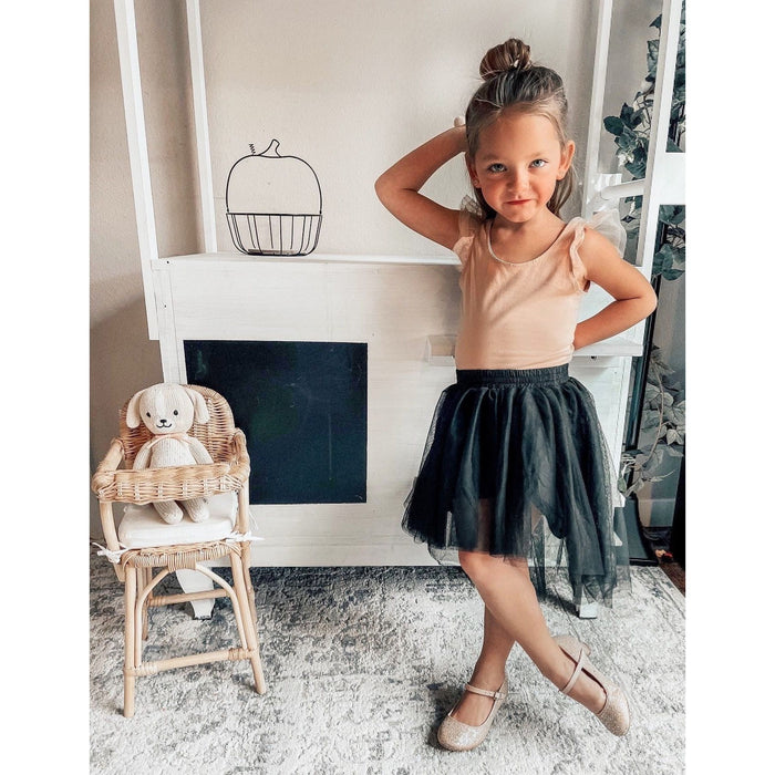 Be Mi Los Angeles high-low tutu skirt displayed on a hanger, showcasing its layered tulle design and playful style.