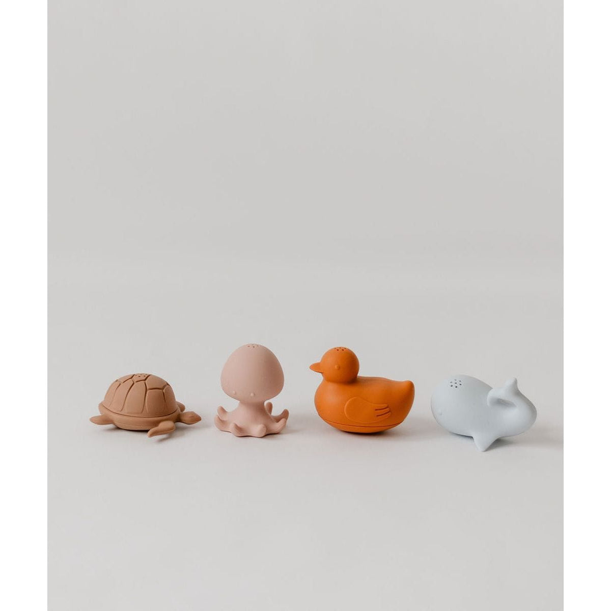 Colorful silicone bath toy for kids, shaped like a friendly animal, from ShopMyLittleSongbird, perfect for bath time fun.