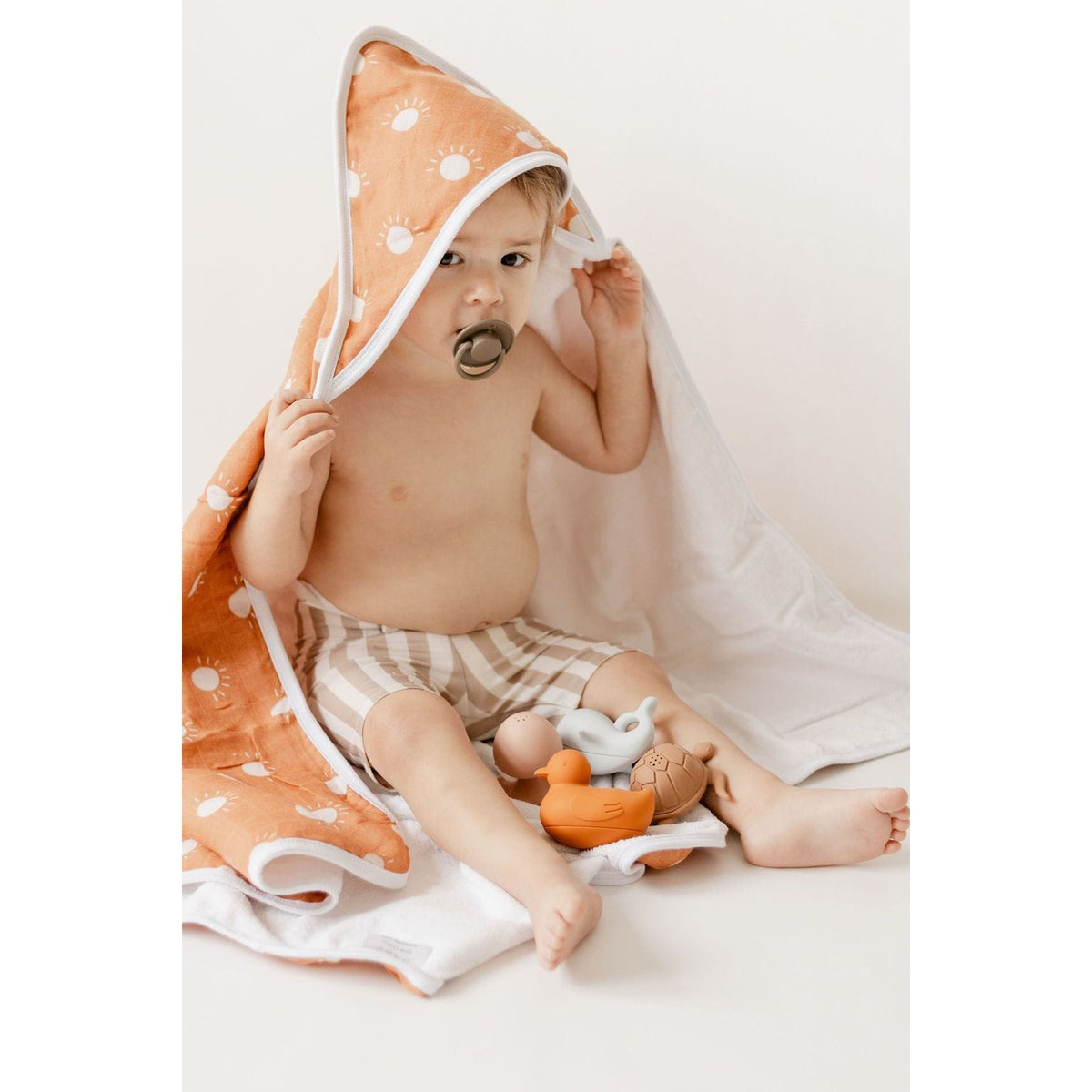 Colorful silicone bath toy by ShopMyLittleSongbird, shaped like a friendly animal, perfect for bath time fun for kids.