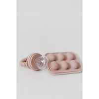 Silicone fruit feeder and ice tray set with colorful silicone inserts for baby feeding and ice making, bright and flexible in design.