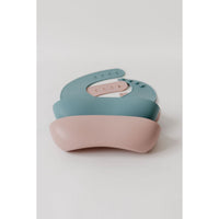 Silicone bib from ShopMyLittleSongbird with adjustable neck strap and food-safe surface, designed for easy cleanup during mealtime.