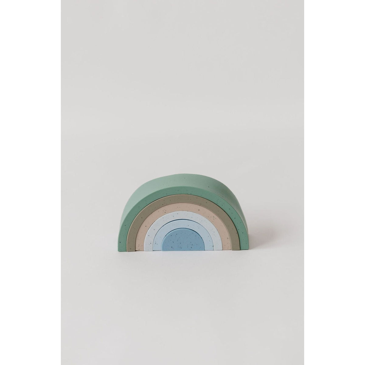 Colorful silicone stacking rainbow toy by ShopMyLittleSongbird with vibrant, curved arcs perfect for kids' play and development.