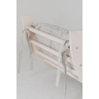 Colorful arch tunnel gym for babies and toddlers, with soft fabric and multiple openings for crawling and play.