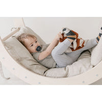 Colorful arch tunnel gym for children, soft fabric and flexible design for indoor play and motor skill development.