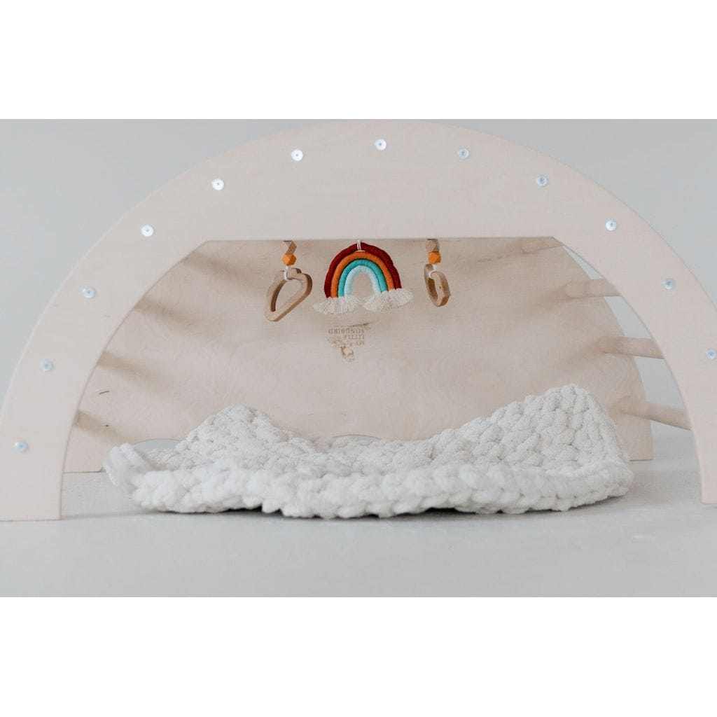 Colorful Arch Activity Gym by ShopMyLittleSongbird with hanging toys and soft fabric for infants' sensory play and development.