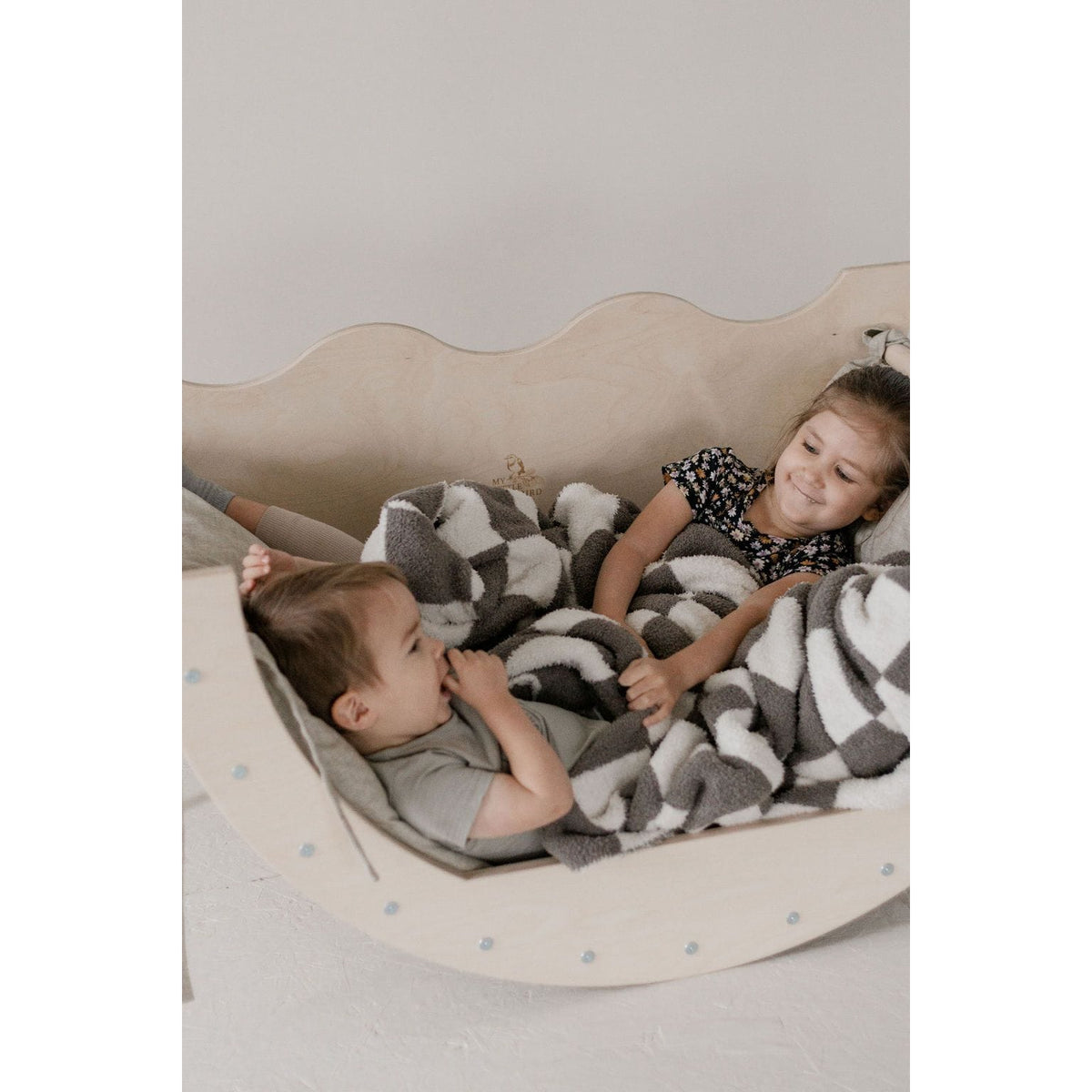 ShopMyLittleSongbird Arch Activity Gym with colorful hanging toys for infants and tummy time play.