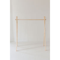 Wooden toddler clothes rack from ShopMyLittleSongbird, featuring a sturdy wooden toy design for organizing children's clothes.