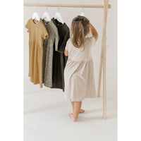 Wooden toddler clothes rack from ShopMyLittleSongbird, featuring a sturdy wooden toy for organizing children's clothing.