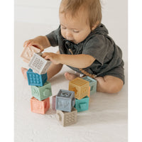 Colorful silicone building blocks set for children, featuring 1-2-3's toy by ShopMyLittleSongbird, arranged in a playful stack.