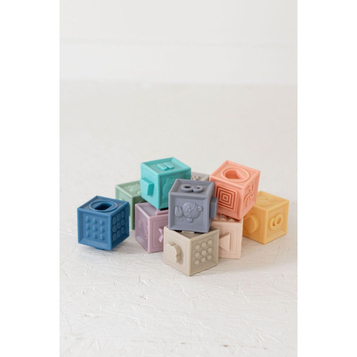 Colorful silicone blocks set for kids' play and learning, featuring various shapes and sizes from ShopMyLittleSongbird.