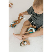Wooden teether with silicone ring for babies, natural and safe teething toy from ShopMyLittleSongbird.