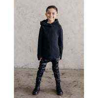 Black organic cotton kids’ hoodie from Be Mi Los Angeles, cozy sweatshirt with a comfortable fit for children.