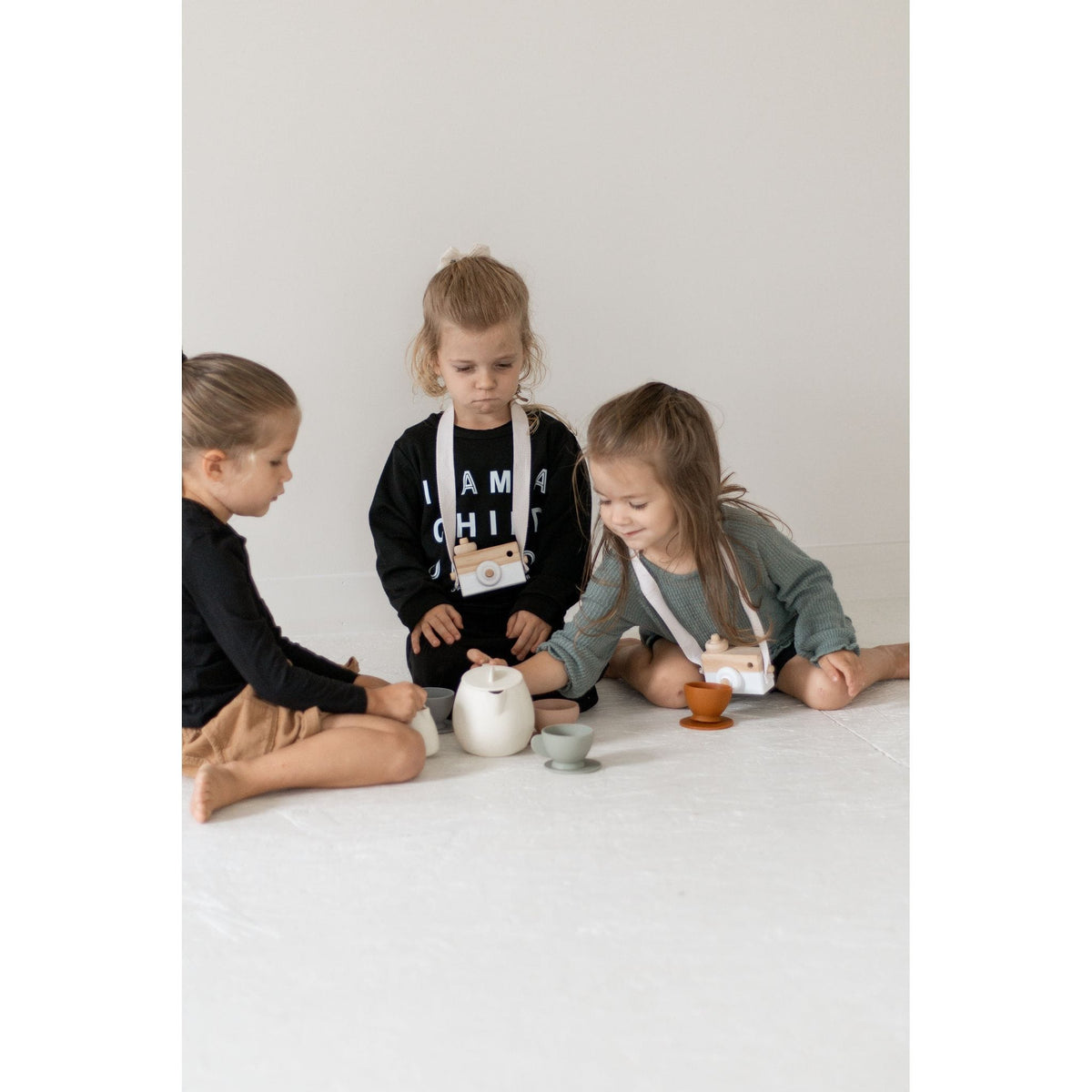 Colorful silicone tea set toy with cups, teapot, and accessories for kids, designed for imaginative play and sensory fun.