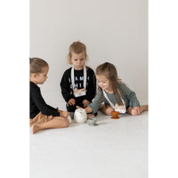 Colorful silicone tea set toy with cups, teapot, and accessories for kids, designed for imaginative play and sensory fun.