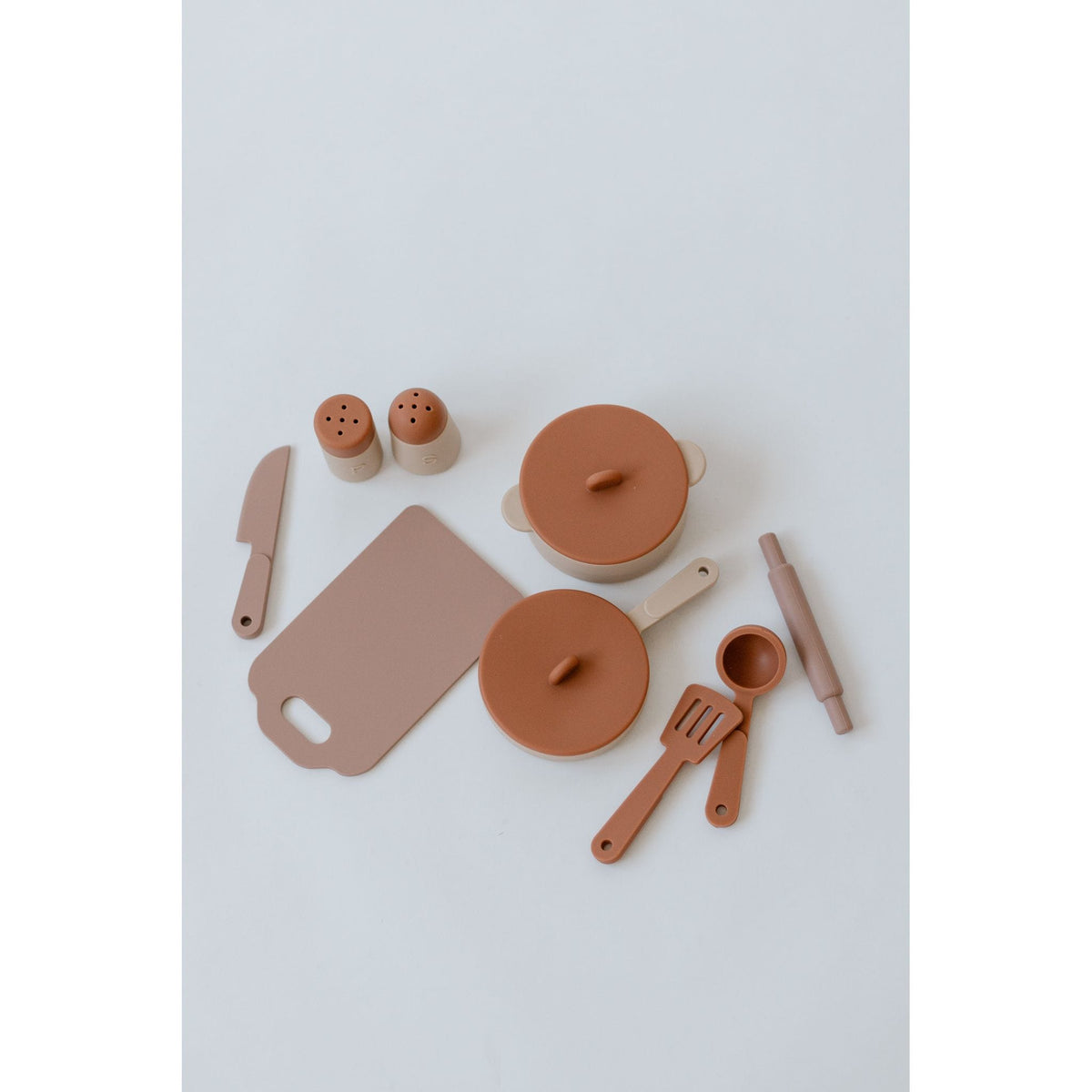 Colorful silicone cooking toy set for kids, includes utensils and pots, perfect for imaginative play and learning cooking skills.