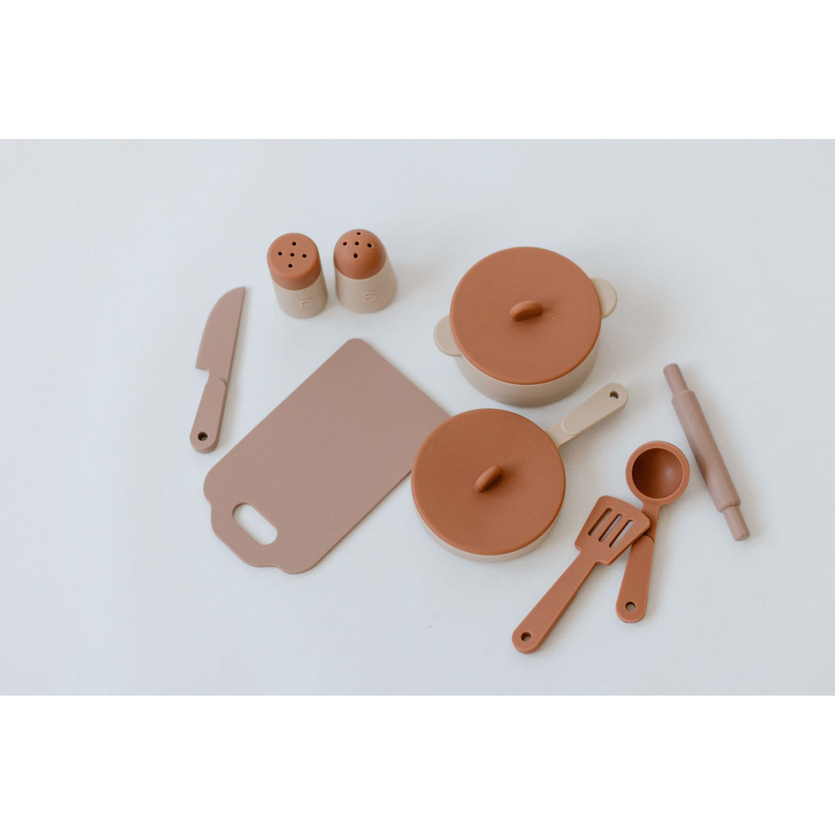Colorful silicone toy cooking set with pots, pans, and utensils, designed for children’s imaginative play by ShopMyLittleSongbird.