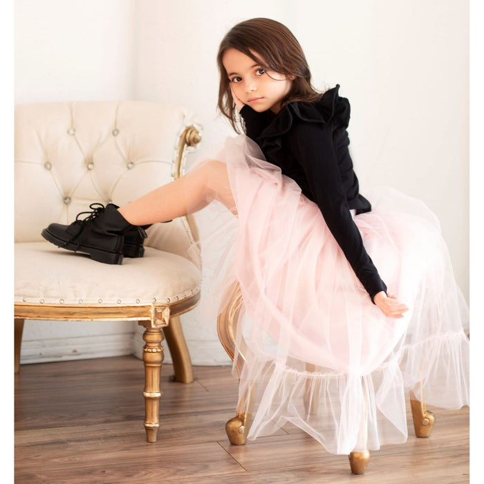Black ballerina skirt by Be Mi Los Angeles, flowing and lightweight with soft fabric, perfect for casual or dance wear.