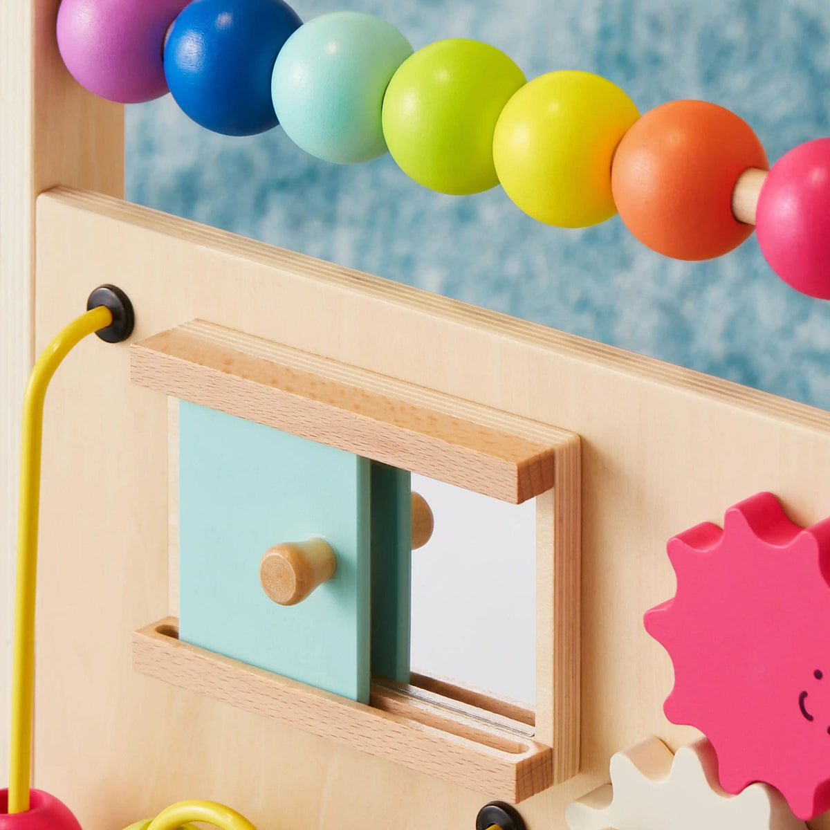Tiny Land® Premium natural wooden baby walker with four wheels and handle, designed for toddler activity and mobility.