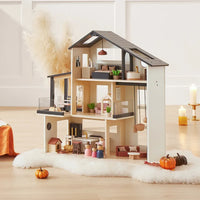 Tiny Land Sweetwood Edge Dollhouse by Tiny Land INC featuring a miniature wooden dollhouse with detailed interior and exterior design.