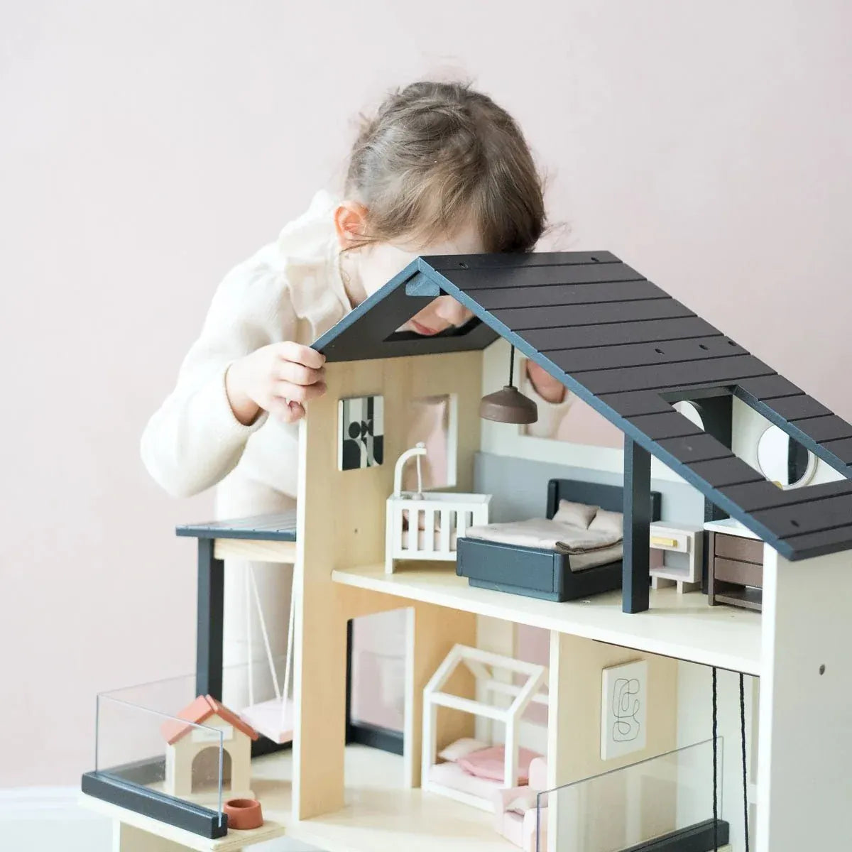Tiny Land® Sweetwood Edge dollhouse featuring a charming miniature wooden dollhouse with detailed design and vibrant colors.