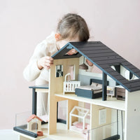 Tiny Land® Sweetwood Edge dollhouse featuring a charming miniature wooden dollhouse with detailed design and vibrant colors.