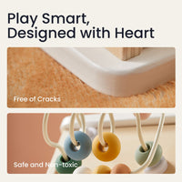 Tiny Land® Cottage Activity Cube in Morandi colors, featuring playful shapes, animal figures, and engaging activities for children.