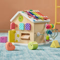 Colorful Tiny Land® Cottage Activity Cube with rainbow design, featuring engaging shapes and activities for children.