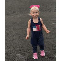 Navy Americana romper by Be Mi Los Angeles, featuring a stylish, casual design perfect for warm weather and summer outings.