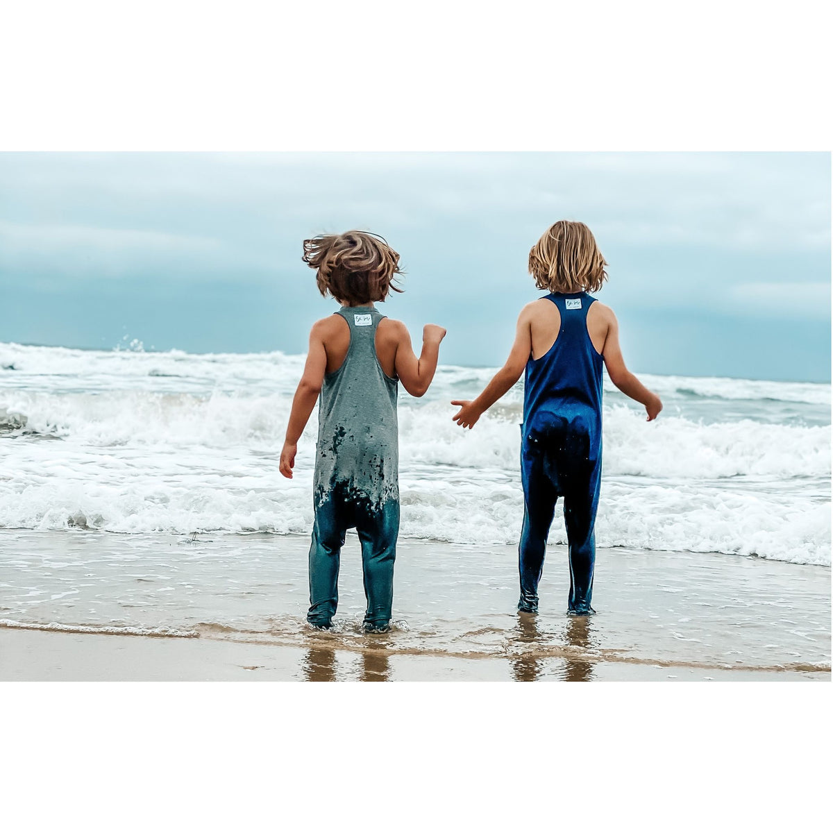 Be Mi Los Angeles Americana Romper in navy, featuring a stylish casual design with short sleeves and comfortable fit.
