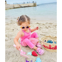 Be Mi Los Angeles bubble gum romper for girls, featuring a playful design and comfortable fit, perfect for casual wear.