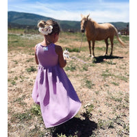 Purple organic Giselle dress by Be Mi Los Angeles, featuring flowy fabric and elegant design, shown in a stylish fashion image.
