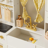 Tiny Land® wooden play kitchen in cream with pretend cooking accessories for kids, featuring realistic stove and countertop details.