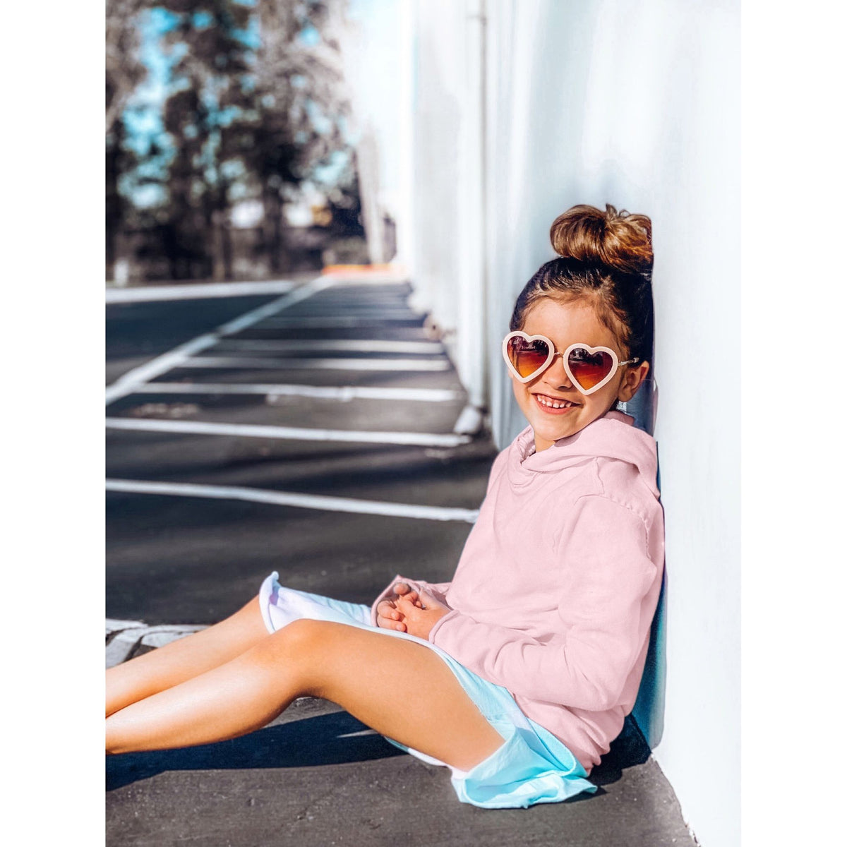 Pink organic Benji hoodie sweatshirt by Be Mi Los Angeles, showing soft fabric and casual fit.