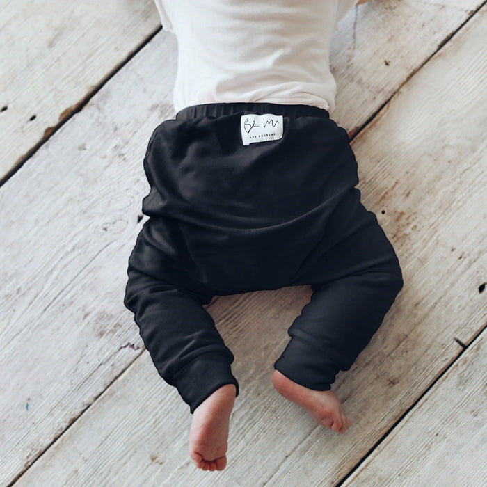 Organic Baby Malibu Pants in black by Be Mi Los Angeles, featuring soft, comfortable fabric and stylish design for infants.