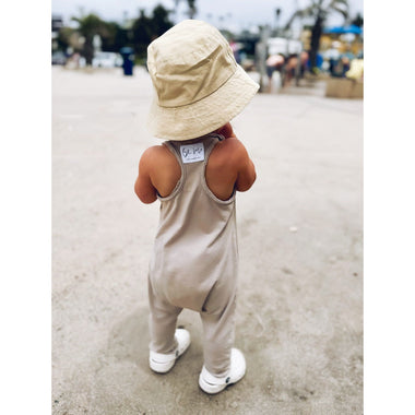 Baby romper in tan color from Be Mi Los Angeles, soft fabric and cute design, perfect for comfortable everyday wear.