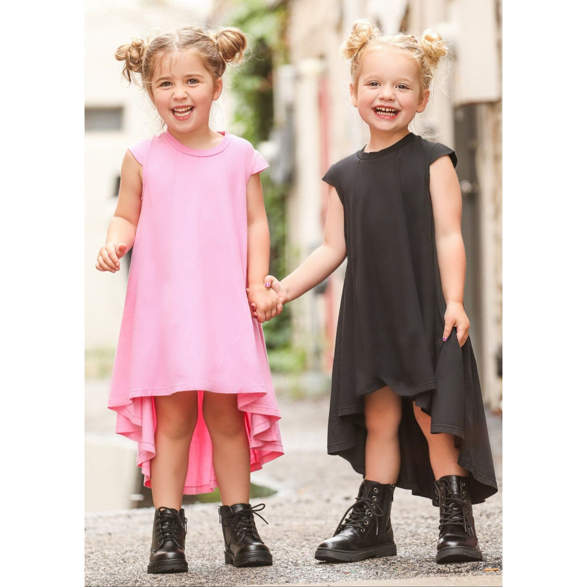 Be Mi Los Angeles Mimi Dress thumbnail featuring a stylish, lightweight dress with a flowing silhouette and vibrant pattern.