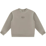 Beige sweatshirt with a logo on a white background