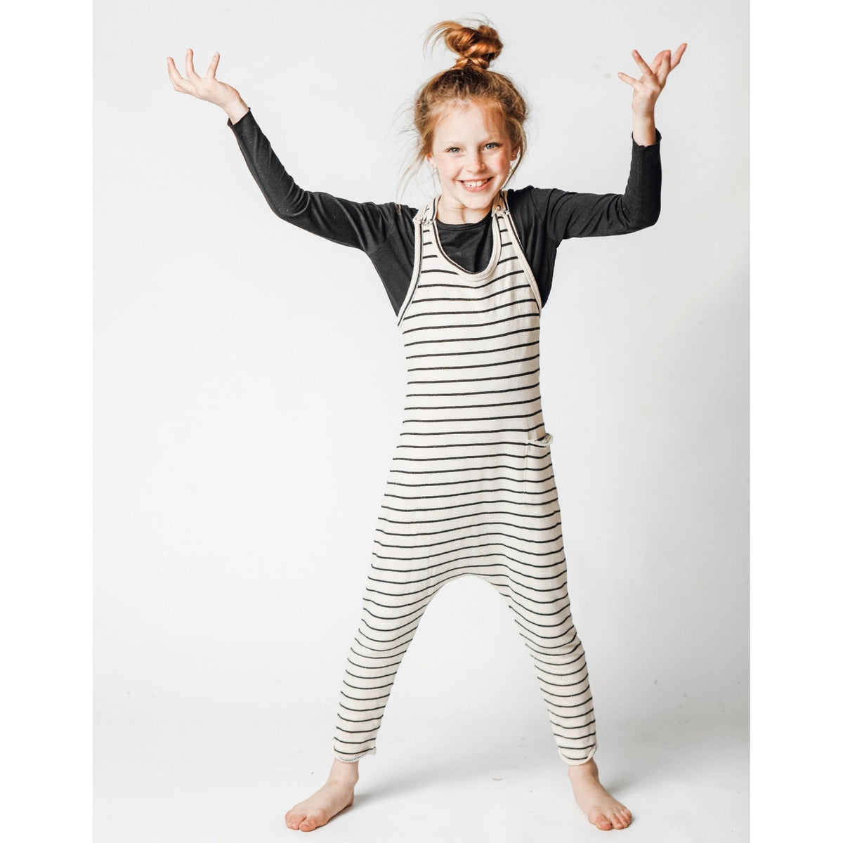 Be Mi Los Angeles limited edition striped romper in natural and black, featuring a stylish and comfortable design.