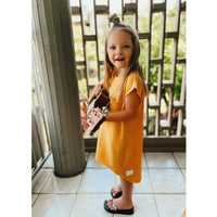 Be Mi Los Angeles Maya Tee Dress, casual short-sleeve dress with a relaxed fit, displayed on a hanger.