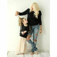 Black organic Jolie top for adults by Be Mi Los Angeles, casual style, lightweight fabric, displayed on a model.