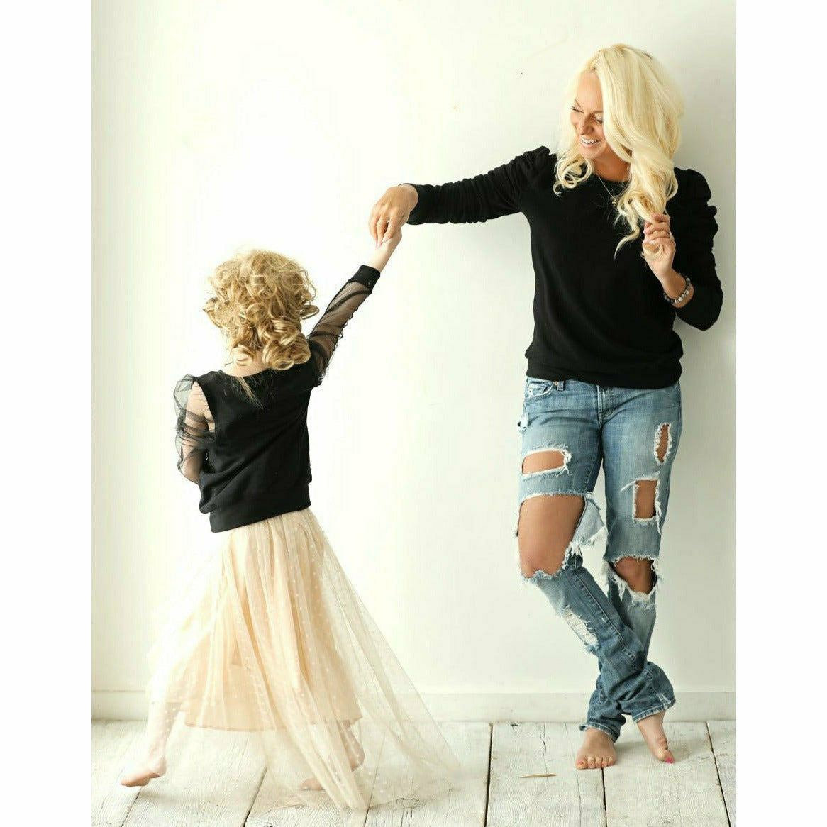 Black organic Jolie top by Be Mi Los Angeles, adult women's fashion top with a stylish, comfortable fit, shown on a model.
