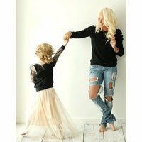 Black organic Jolie top by Be Mi Los Angeles, adult women's fashion top with a stylish, comfortable fit, shown on a model.