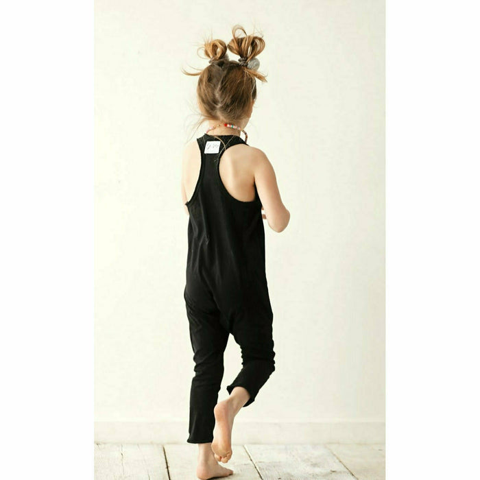 Black romper from Be Mi Los Angeles featuring a stylish, casual design perfect for warm weather.