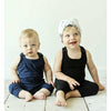 boys wearing cotton soft romper jumpsuits and organic beanie