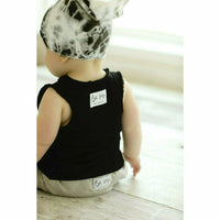 Black Asher Baby Tank Top by Be Mi Los Angeles, soft cotton sleeveless shirt for infants, with simple design and comfortable fit.