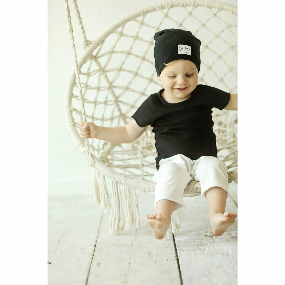 Black Asher Baby Tee by Be Mi Los Angeles, casual short-sleeve t-shirt with a relaxed fit for everyday wear.