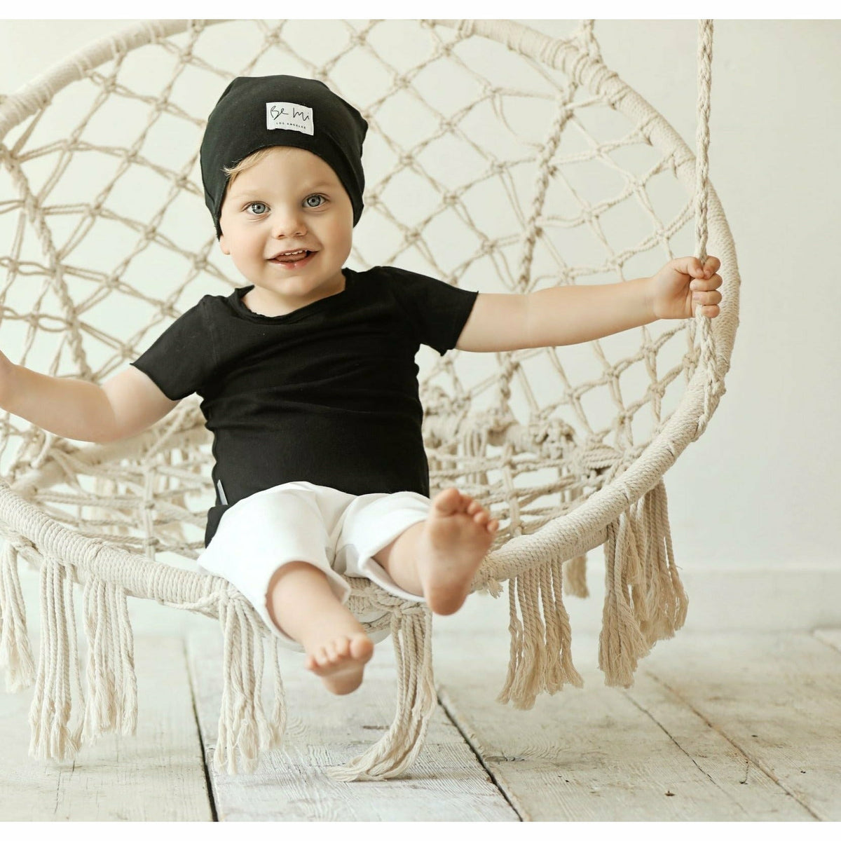 Soft baby organic beanie by Be Mi Los Angeles, showing a cozy, snug hat in neutral colors for infant warmth and comfort.