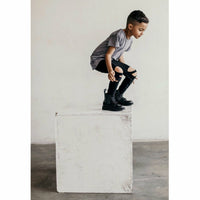 Be Mi Los Angeles Raw Edge Tee displayed on a model, showcasing its casual, distressed neckline and soft cotton fabric.