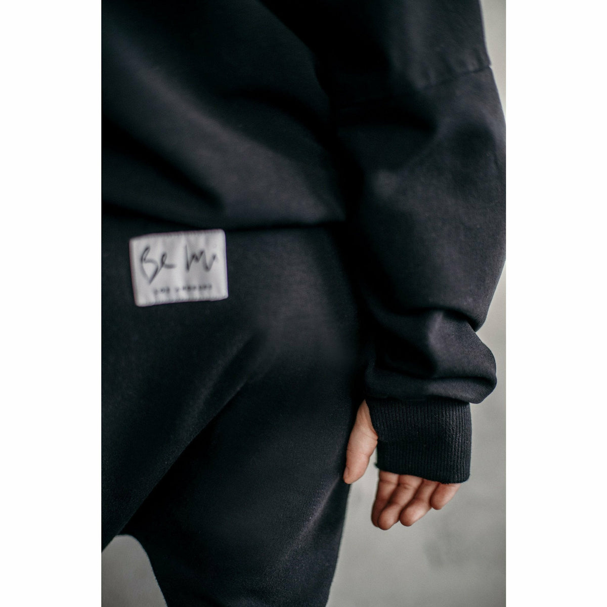 Organic Malibu Joggers by Be Mi Los Angeles in distressed black, featuring a relaxed fit and casual style.