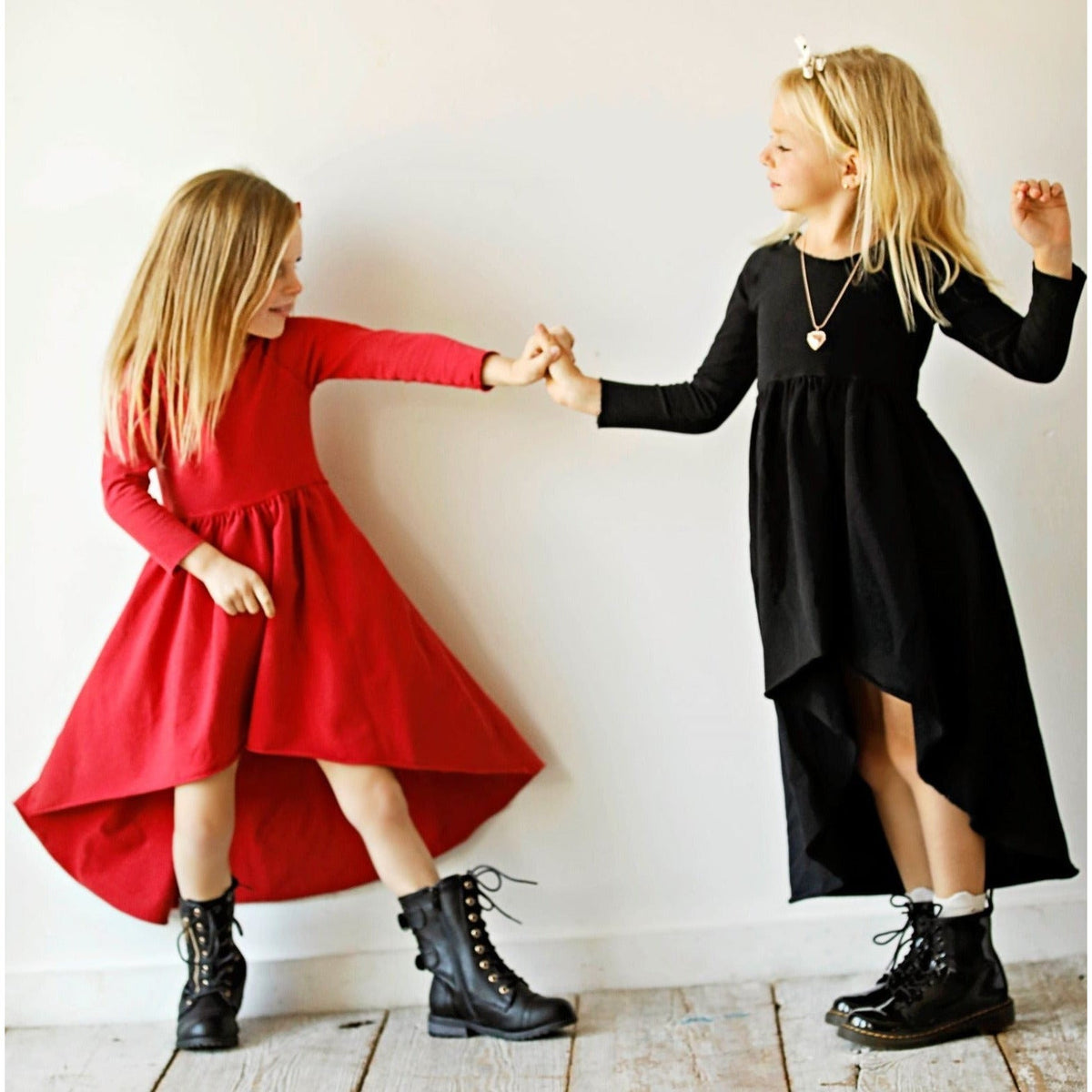 Black organic Giselle dress by Be Mi Los Angeles featuring long sleeves, elegant and comfortable for casual or formal wear.